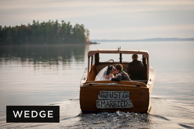 Migis Lodge Wedding: boat ride on sebago lake in Maine.