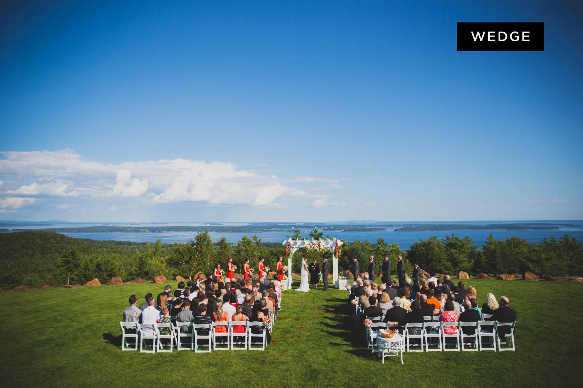 A wedding ceremony & reception at Point Lookout Resort in Lincolnville, Maine. Photographs by The award winning photographers at Boathouse Studios.